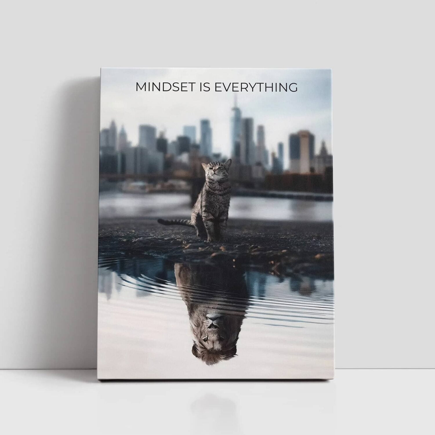 Mindset is Everything Canvas featuring a cat looking into a puddle and seeing a lion in as the reflection. Printing in County Monaghan, Ireland