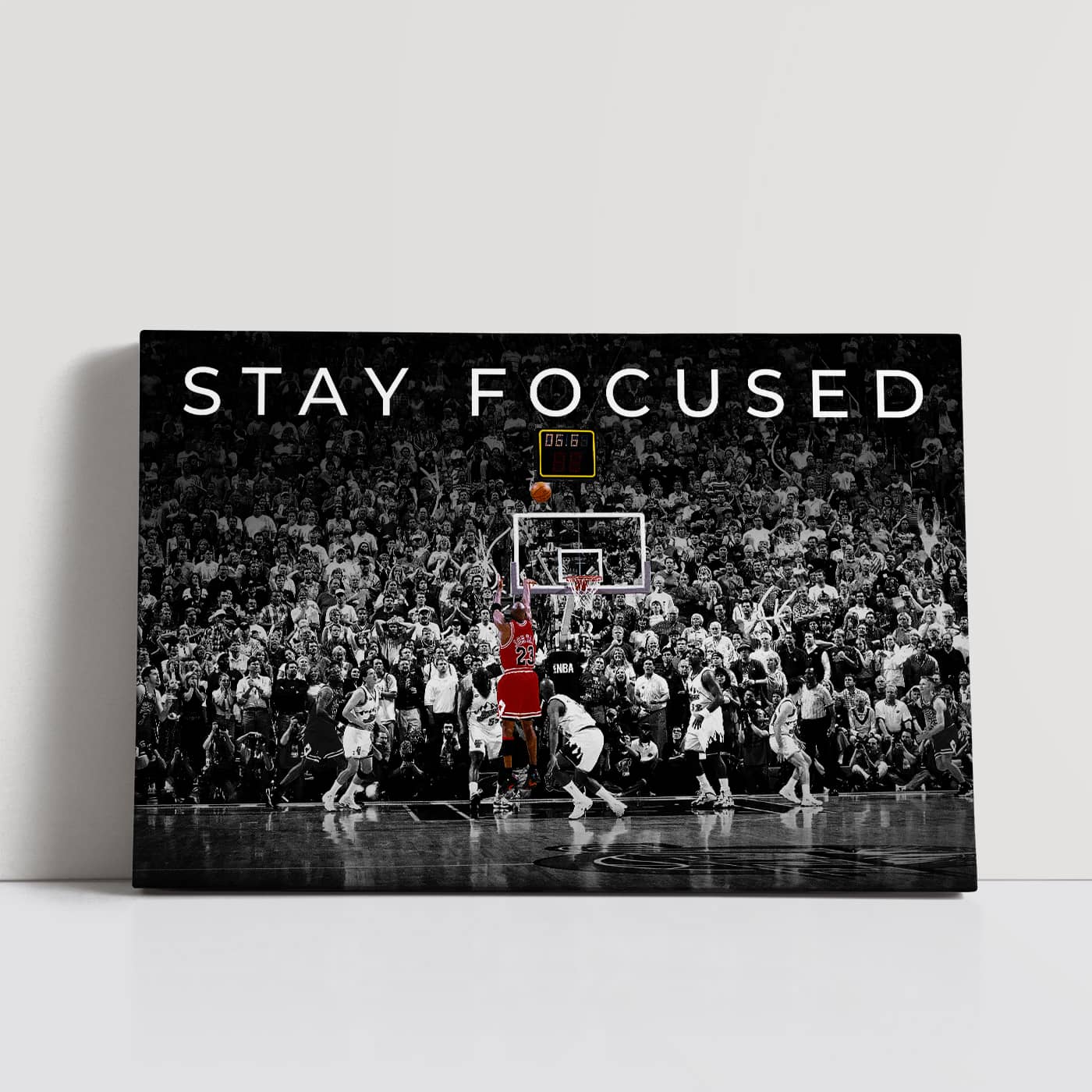 Stay Focused Canvas featuring the iconic image of Michael Jordan sinking the heart-stopping buzzer-beater shot against the Cleveland Cavaliers